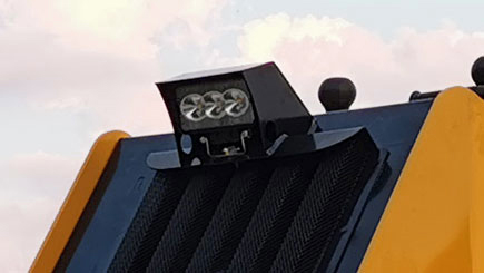 The front lighting system is securely encased in a metal frame to keep it protected from damage