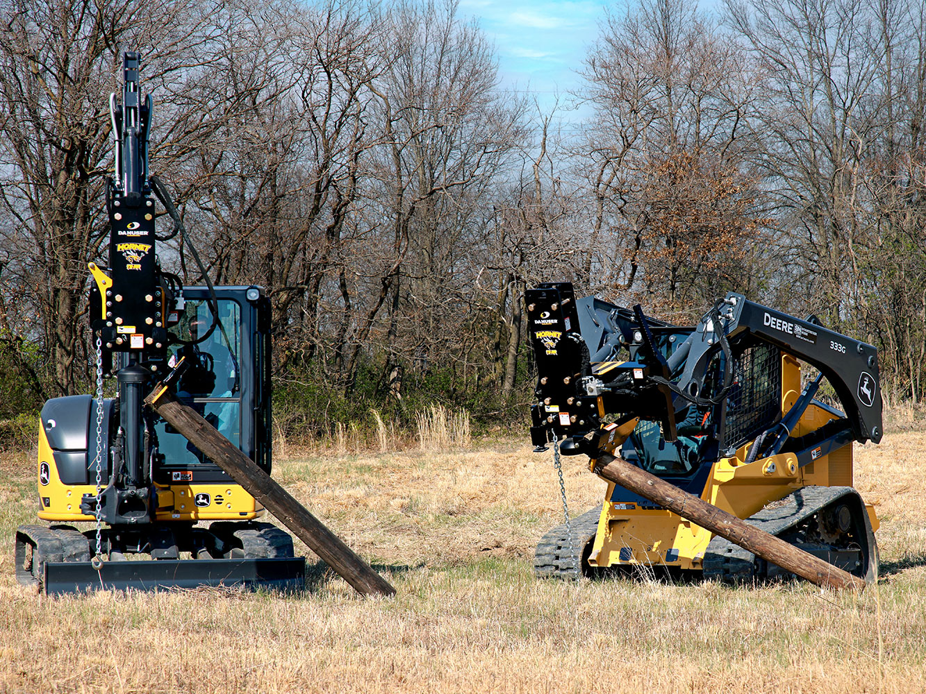 THE GRAPPLE OPTION WILL ALLOW THE OPERATOR TO GRAB THE POST OFF THE GROUND, LOAD THE POST INTO THE HAMMER, AND DRIVE IT INTO THE GROUND. WITHOUT LEAVING THE SEAT.