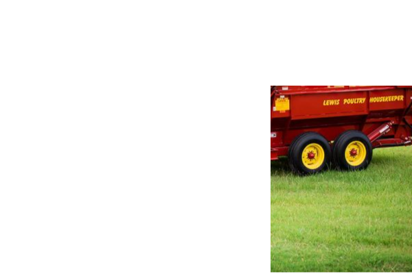 The tandem axle provides a wider base, which helps stability. 
It also helps absorb rough terrain better.