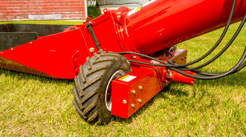 The Posi-Track dual wheel drive system offers a fast and efficient operation. The unit drives both wheels at the same time which distributes more power for moving the hopper into position. Treaded tires are standard to help keep the unit moving in any tough yard conditions.